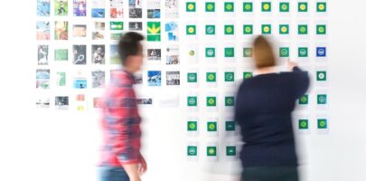 two people figuring out brand consistency on a whiteboard